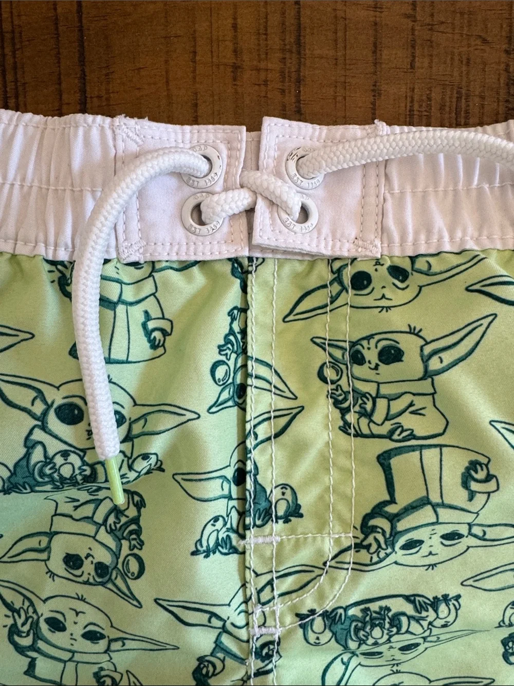 GAP Baby Yoda Print Swim Trunks in Light Green with White Waistband